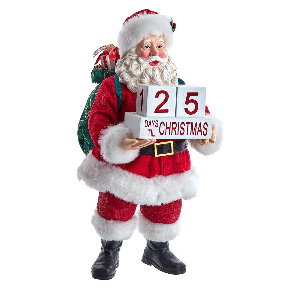 Holiday decoration featuring Fabriché™ Countdown Santa Figurine, 10.5 Inches