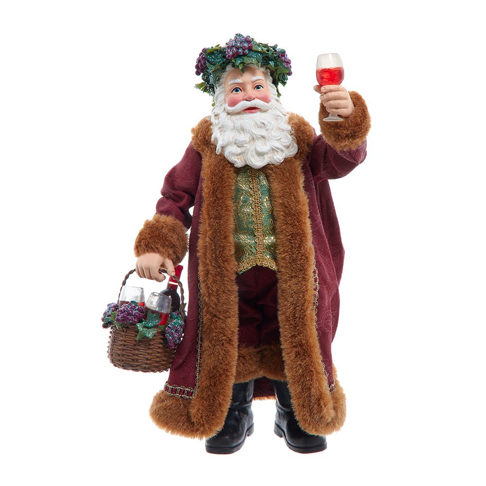Wine-themed Santa figurine holding a bottle and glass, dressed in vineyard reds